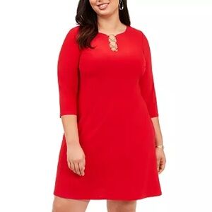 Red dress with gold ring embellishment